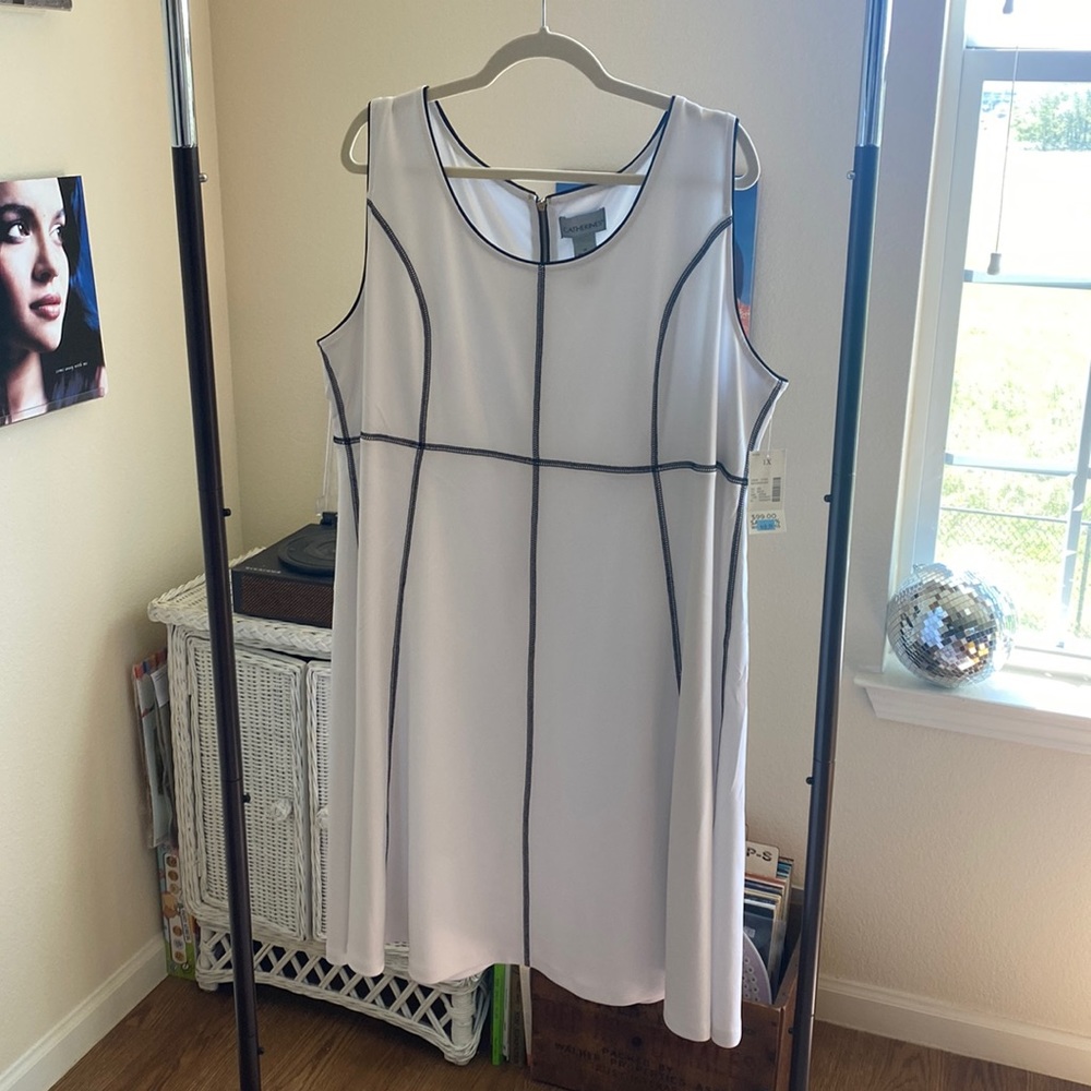 Catherine’s new, never worn with tags.